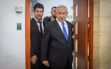 Former prime minister Benjamin Netanyahu arrives at the Jerusalem District Court for a hearing in his corruption trial on May 11, 2022. (Yonatan Sindel/Flash90)