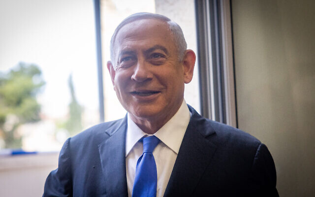 Former Israeli prime minister Benjamin Netanyahu arrives for a court hearing in his trial, at the District Court in Jerusalem on May 11, 2022. (Yonatan Sindel/Flash90)