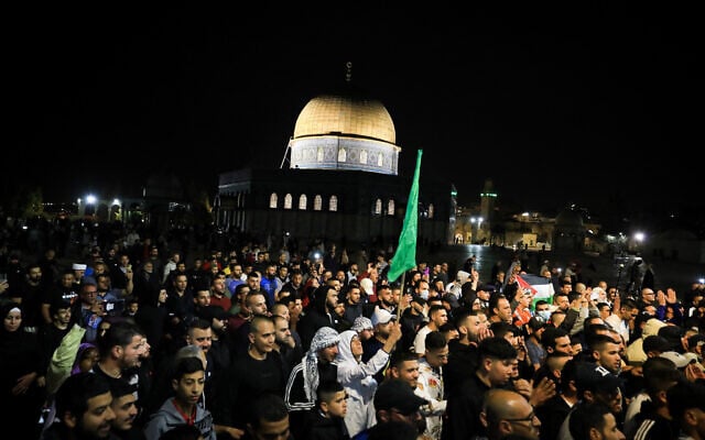 Palestinians carry the coffin of Walid a-Sharif, during his funeral in Jerusalem Old City on May 16, 2022, Walid al-Sharif died from his wounds suffered last month during clashes with Israeli police at the Al-Aqsa Mosque on the Temple Mount. (Jamal Awad/Flash90) Palestinians carry the coffin of Walid a-Sharif, during his funeral in Jerusalem Old City on May 16, 2022, Walid al-Sharif died from his wounds suffered last month during clashes with Israeli police at the Al-Aqsa Mosque on the Temple Mount. (Jamal Awad/Flash90)