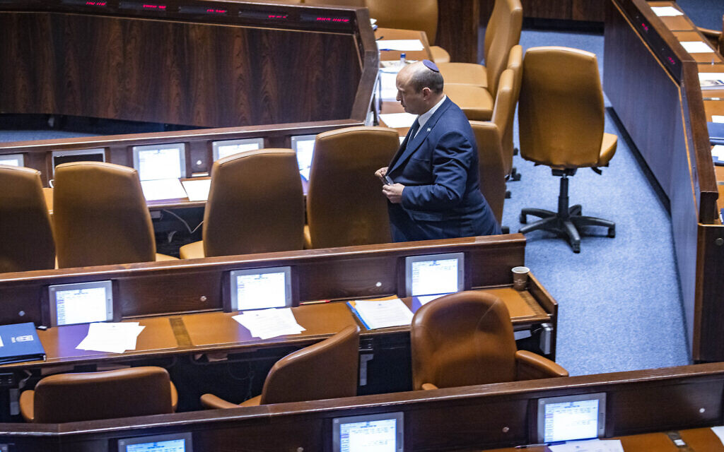 Naftali Bennett walks in the Knesset on May 16, 2022. (Olivier Fitoussi/FLASH90) Naftali Bennett walks in the Knesset on May 16, 2022. (Olivier Fitoussi/FLASH90)