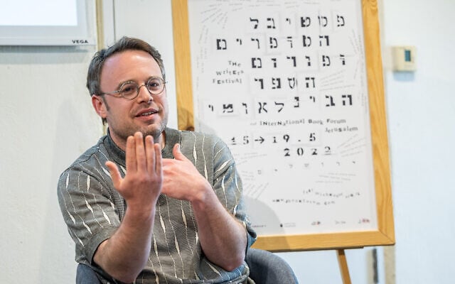 American novelist Joshua Cohen speaks during a meeting with journalists as part of the International Writers Festival, in Jerusalem, May 16, 2022. (Courtesy Yonatan Sindel/Flash 90)
