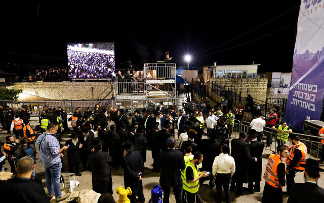 Ultra-Orthodox Jews dance Lag B'Omer celebrations on Mount Meron on May 18, 2022. (David Cohen/Flash90)