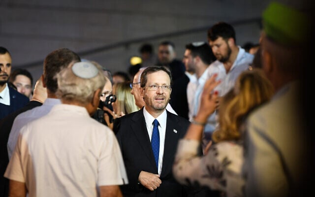 President Isaac Herzog arrives to the Jerusalem Day official ceremony at Ammunition Hill in Jerusalem, on May 29, 2022. (Arie Leib Abrams/Flash90) President Isaac Herzog arrives to the Jerusalem Day official ceremony at Ammunition Hill in Jerusalem, on May 29, 2022. (Arie Leib Abrams/Flash90)