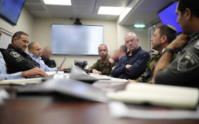 Defense Minister Benny Gantz holds a meeting with military and security officials on May 7, 2022, as a manhunt for the perpetrators of the deadly Elad terror attack continues. (Elad Malka) Defense Minister Benny Gantz holds a meeting with military and security officials on May 7, 2022, as a manhunt for the perpetrators of the deadly Elad terror attack continues. (Elad Malka)