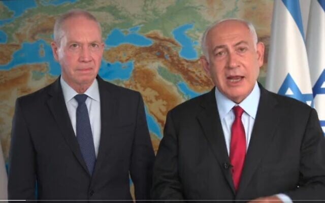 Screen capture from video of opposition leader MK Benjamin Netanyahu, right, and fellow Likud party member MK Yoav Gallant, May 19, 2022. (Twitter) Screen capture from video of opposition leader MK Benjamin Netanyahu, right, and fellow Likud party member MK Yoav Gallant, May 19, 2022. (Twitter)