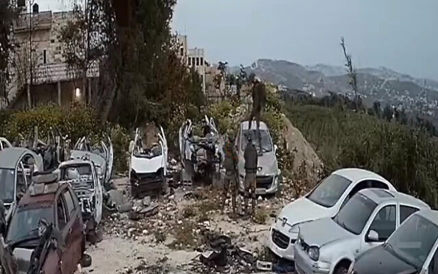 Soldiers damage cars in a scrapyard in the West Bank town of Burqa, on April 15, 2022. (Screenshot : B'Tselem/Twitter) Soldiers damage cars in a scrapyard in the West Bank town of Burqa, on April 15, 2022. (Screenshot : B'Tselem/Twitter)