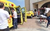 First responders work at the site where a man set himself alight outside the Ashdod Municipality on May 1, 2022. (Magen David Adom)