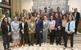 President Isaac Herzog and his wife Michal (to his right) pose with members of the President's Climate Forum, at the President's Residence in Jerusalem on May 17, 2022. Dov Khenin is third from right. (Amos Ben-Gershom/GPO)