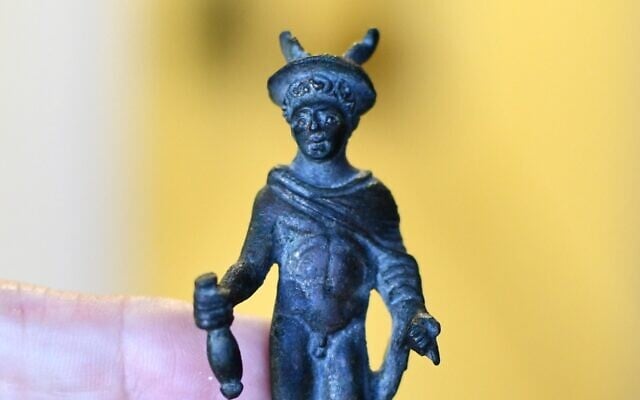 Statue of god Hermes seized in a massive illegal trade bust on May 15, 2022 in Modi'in. (Yoli Schwartz/Israel Antiquities Authority)