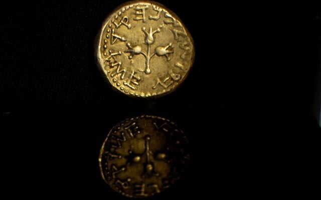 Silver shekel coin from 67CE seized in a massive illegal trade bust on May 15, 2022 in Modi'in. (Yoli Schwartz/Israel Antiquities Authority)