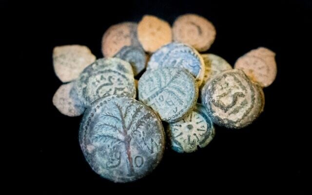Some of the ancient coins seized in a massive illegal trade bust on May 15, 2022 in Modi'in. (Yoli Schwartz/Israel Antiquities Authority)