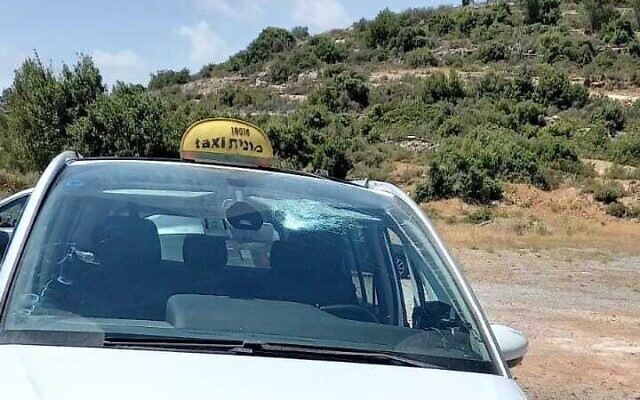 A car damaged by Palestinian stone-throwing near Neria on May 23, 2022. (Binyamin Regional Council) A car damaged by Palestinian stone-throwing near Neria on May 23, 2022. (Binyamin Regional Council)
