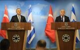 Foreign Minister Yair Lapid (R) speaks alongside his Turkish counterpart Mevlut Cavusoglu at the Foreign Ministry in Jerusalem, May 25, 2022. (Asi Efrati/GPO)