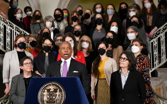 New York City Mayor Eric Adams, with Rabbi Sharon Kleibaum, left, and Rabbi Rachel Timoner, right, speaks at a press conference after meeting with 55 women rabbis at City Hall, May 19, 2022. (Gili Getz via JTA) New York City Mayor Eric Adams, with Rabbi Sharon Kleibaum, left, and Rabbi Rachel Timoner, right, speaks at a press conference after meeting with 55 women rabbis at City Hall, May 19, 2022. (Gili Getz via JTA)