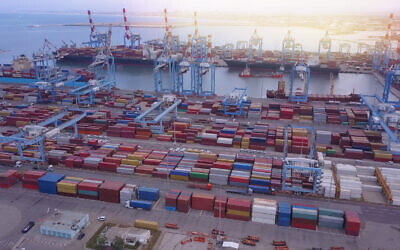 The port in Haifa with anchor ships, cranes and cargo containers. (MagioreStock via iStock by Getty Images)