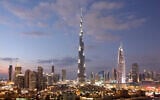 The Burj Khalifa and downtown Dubai at dusk. (typhoonski via iStock by Getty Images)