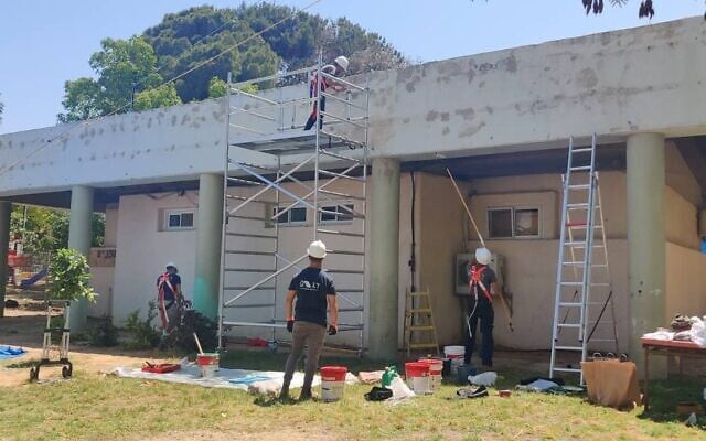 Defense Ministry and military engineers work to reinforce the rocket defenses at a kindergarten in the southern town of Gvar'am, May 25, 2022. (Defense Ministry) Defense Ministry and military engineers work to reinforce the rocket defenses at a kindergarten in the southern town of Gvar'am, May 25, 2022. (Defense Ministry)