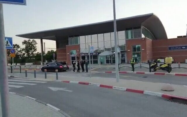The site of a shooting, suspected of being related to criminal activity, where two people were injured, at the Rosh Ha'ayin train station, on May 7, 2022. (Magen David Adom/Screesnhot) The site of a shooting, suspected of being related to criminal activity, where two people were injured, at the Rosh Ha'ayin train station, on May 7, 2022. (Magen David Adom/Screesnhot)