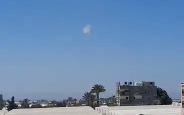 A cloud of smoke is seen over the Gaza Strip, after the Iron Dome intercepted a drone, May 19, 2022 (screenshot: Twitter) A cloud of smoke is seen over the Gaza Strip, after the Iron Dome intercepted a drone, May 19, 2022 (screenshot: Twitter)