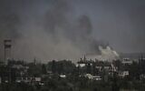 Smoke rises in the city of Severodonetsk during fighting between Ukrainian and Russian troops, in Ukraine's eastern region of Donbas on June 2, 2022. (Aris Messinis/AFP)