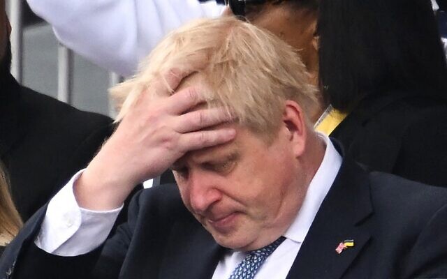 Britain's Prime Minister Boris Johnson reacts during the Platinum Pageant in London on June 5, 2022 as part of Queen Elizabeth II's platinum jubilee celebrations (Leon Neal / POOL / AFP) Britain's Prime Minister Boris Johnson reacts during the Platinum Pageant in London on June 5, 2022 as part of Queen Elizabeth II's platinum jubilee celebrations (Leon Neal / POOL / AFP)