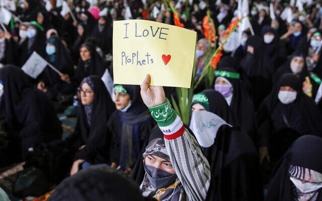 Iranians attend a gathering at the Tehran University on June 10, 2022, to protest to condemn remarks about the Prophet Mohammed made by a top official in India's ruling party. (AFP)