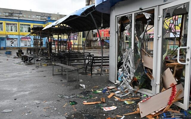 This picture shows destroyed shopping pavilions at a bus station in the Ukrainian town of Chuhuiv, Kharkiv region, on June 24, 2022, as Russia has intensified its offensive in the area in the past few days. (Sergey Bobok/AFP)