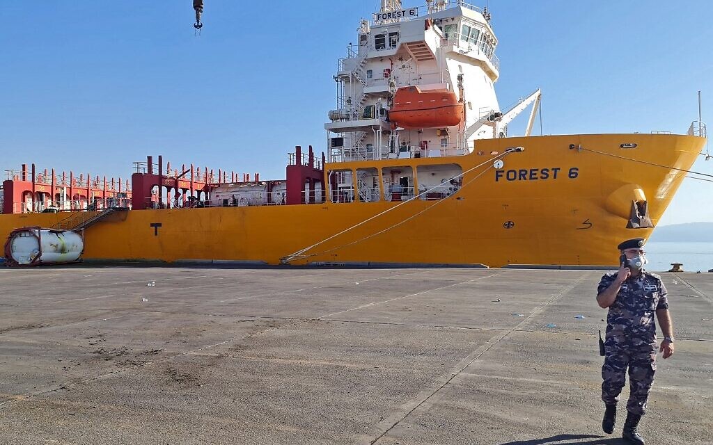 A general view shows the tank (L) that fell while being transported, causing a toxic gas leak in Jordan's Aqaba port on June 27, 2022. (AFP)