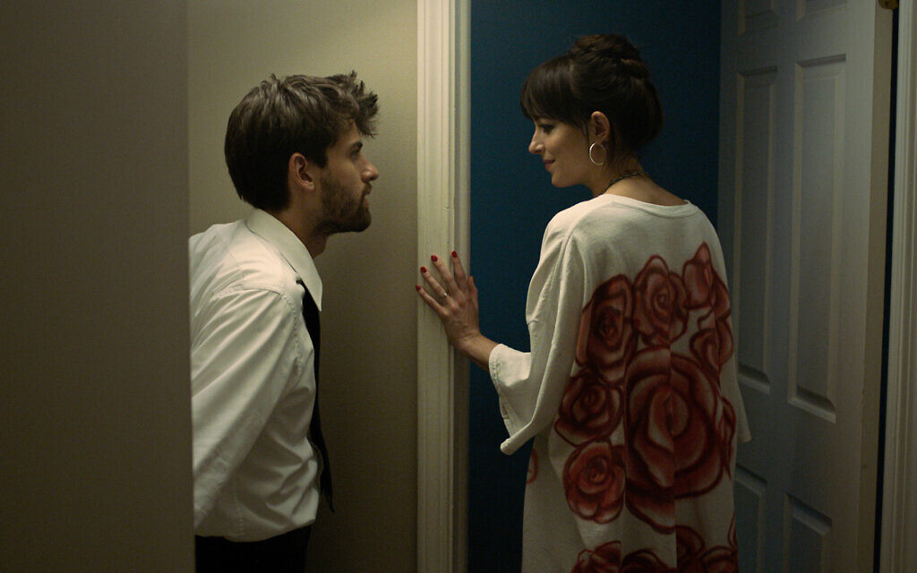 Cooper Raiff and Dakota Johnson in 'Cha Cha Real Smooth.' (Courtesy of Apple/ via JTA) Cooper Raiff and Dakota Johnson in 'Cha Cha Real Smooth.' (Courtesy of Apple/ via JTA)
