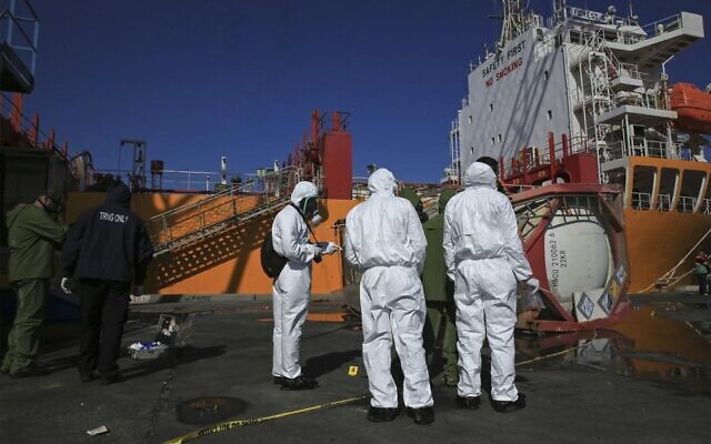 Experts investigate a toxic gas explosion in Jordan's Red Sea port of Aqaba, Tuesday, June 28, 2022. (AP Photo/Raad Adayleh) Experts investigate a toxic gas explosion in Jordan's Red Sea port of Aqaba, Tuesday, June 28, 2022. (AP Photo/Raad Adayleh)