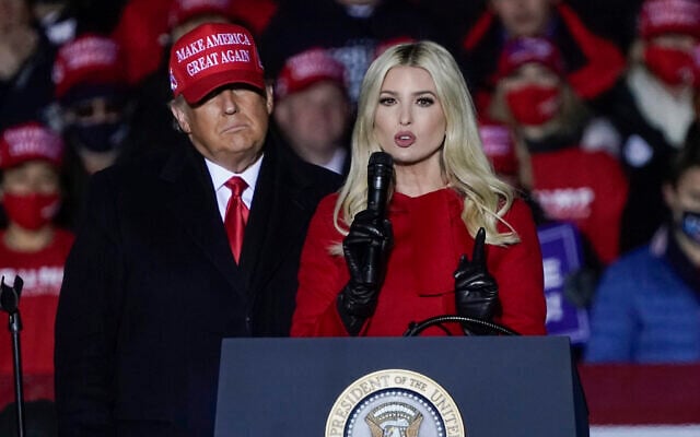 In this November 2, 2020 file photo, Ivanka Trump speaks at a campaign event while her father, then-US president Donald Trump, watches in Kenosha, Wis. (AP Photo/Morry Gash, File)