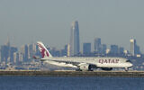 A Qatar Airways plane prepares to take off at San Francisco International Airport during the coronavirus pandemic in San Francisco, December 22, 2020(AP Photo/Jeff Chiu, File)