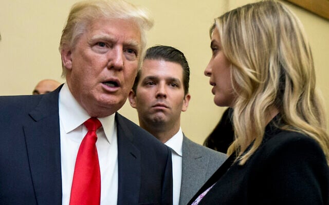 Donald Trump, left, Donald Trump Jr., center, and his daughter Ivanka Trump speak during the unveiling of the design for the Trump International Hotel in the The Old Post Office in Washington, on Sept. 10, 2013. In papers filed Monday, March 21, 2022, in a state appeals court, former President Trump's lawyers say a New York judge abused his discretion with a decision in February requiring the former president to answer questions under oath in a civil investigation into his business practices. (AP Photo/Manuel Balce Ceneta, File) Donald Trump, left, Donald Trump Jr., center, and his daughter Ivanka Trump speak during the unveiling of the design for the Trump International Hotel in the The Old Post Office in Washington, on Sept. 10, 2013. In papers filed Monday, March 21, 2022, in a state appeals court, former President Trump's lawyers say a New York judge abused his discretion with a decision in February requiring the former president to answer questions under oath in a civil investigation into his business practices. (AP Photo/Manuel Balce Ceneta, File)