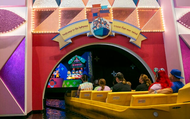 People visit the "it's a small world" ride at Walt Disney World Resort in Lake Buena Vista, Florida, on Monday, April 18, 2022. (AP Photo/Ted Shaffrey)