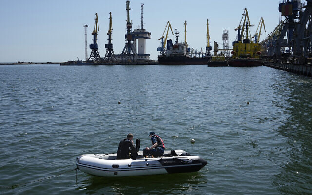 Servicemen of Donetsk People's Republic Emergency Ministry work to defuse a Ukrainian mine in an area of the Mariupol Sea Port in Mariupol, in territory under the government of the Donetsk People's Republic, eastern Ukraine, on April 29, 2022. This photo was taken during a trip organized by the Russian Ministry of Defense. (AP) Servicemen of Donetsk People's Republic Emergency Ministry work to defuse a Ukrainian mine in an area of the Mariupol Sea Port in Mariupol, in territory under the government of the Donetsk People's Republic, eastern Ukraine, on April 29, 2022. This photo was taken during a trip organized by the Russian Ministry of Defense. (AP)