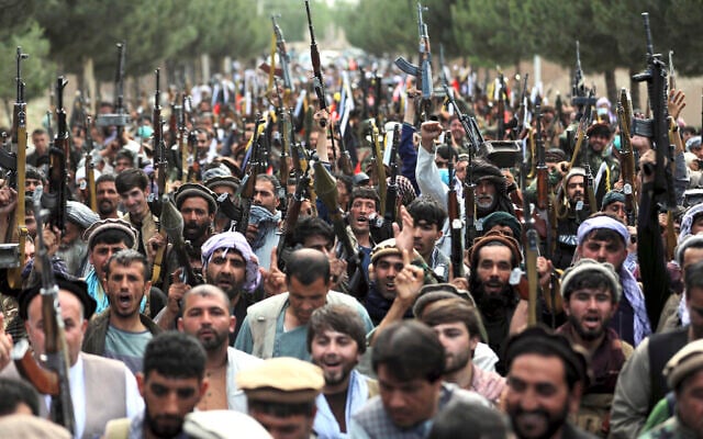 Afghan militiamen join Afghan defense and security forces during a gathering in Kabul, Afghanistan, on June 23, 2021. (AP Photo/Rahmat Gul, File) Afghan militiamen join Afghan defense and security forces during a gathering in Kabul, Afghanistan, on June 23, 2021. (AP Photo/Rahmat Gul, File)