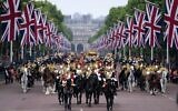 Soldiers parade during the Platinum Jubilee Pageant outside Buckingham Palace in London, June 5, 2022, on the last of four days of celebrations to mark the Platinum Jubilee. (AP Photo/Frank Augstein, Pool)