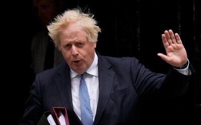 British Prime Minister Boris Johnson leaves 10 Downing Street to attend the weekly Prime Minister's Questions at the Houses of Parliament, in London, May 25, 2022. (AP Photo/Matt Dunham, File)