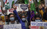 Indian Muslims shout slogans as they react to the derogatory references to Islam and the Prophet Muhammad made by top officials in the governing Hindu nationalist party during a protest in Mumbai, India, Monday, June 6, 2022.  (AP Photo/Rafiq Maqbool)
