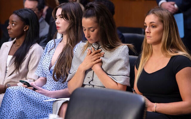 United States gymnasts from left, Simone Biles, McKayla Maroney, Aly Raisman and Maggie Nichols, arrive to testify during a Senate Judiciary hearing about the Inspector General's report on the FBI's handling of the Larry Nassar investigation on Capitol Hill, in Washington, Sept. 15, 2021. (Saul Loeb/Pool via AP, File) United States gymnasts from left, Simone Biles, McKayla Maroney, Aly Raisman and Maggie Nichols, arrive to testify during a Senate Judiciary hearing about the Inspector General's report on the FBI's handling of the Larry Nassar investigation on Capitol Hill, in Washington, Sept. 15, 2021. (Saul Loeb/Pool via AP, File)