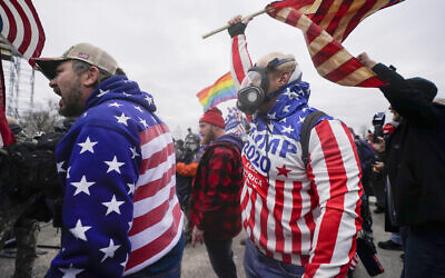 Rioters shout at the US Capitol on Jan. 6, 2021, in Washington. (Julio Cortez/AP)