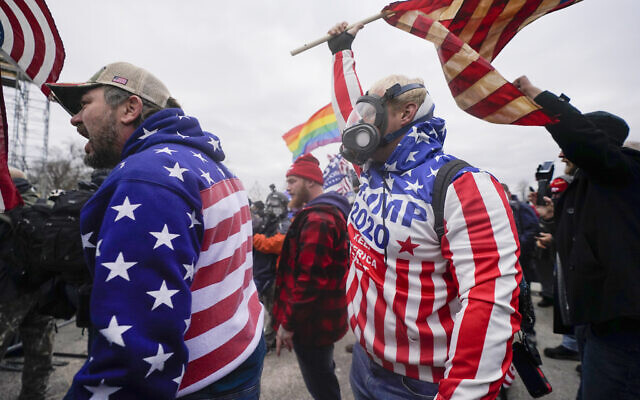 Rioters shout at the US Capitol on Jan. 6, 2021, in Washington. (Julio Cortez/AP) Rioters shout at the US Capitol on Jan. 6, 2021, in Washington. (Julio Cortez/AP)
