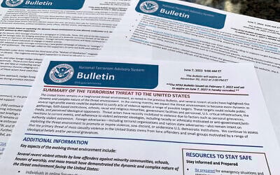 The bulletin issued by the Department of Homeland Security, outlining the current terrorism threat to the United States, is photographed Thursday, June 9, 2022. (AP Photo/Jon Elswick)