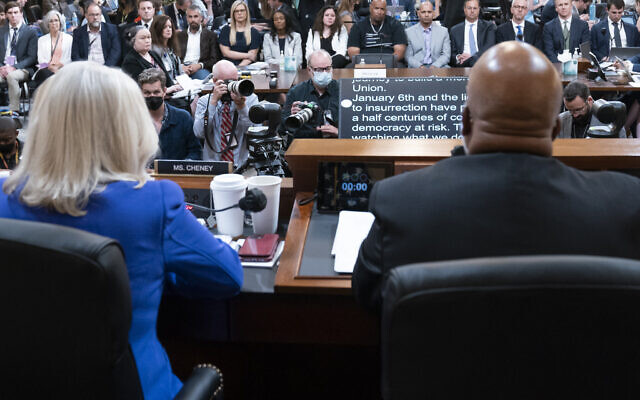 Vice Chair Liz Cheney, R-Wyo., left, listens as Chairman Bennie Thompson, D-Miss., gives an opening statement as the House select committee investigating the Jan. 6 attack on the U.S. Capitol holds its first public hearing to reveal the findings of a year-long investigation, on Capitol Hill in Washington, Thursday, June 9, 2022. (AP Photo/Alex Brandon, Pool) Vice Chair Liz Cheney, R-Wyo., left, listens as Chairman Bennie Thompson, D-Miss., gives an opening statement as the House select committee investigating the Jan. 6 attack on the U.S. Capitol holds its first public hearing to reveal the findings of a year-long investigation, on Capitol Hill in Washington, Thursday, June 9, 2022. (AP Photo/Alex Brandon, Pool)