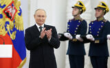 Russian President Vladimir Putin attends the State Prize awards ceremony while marking Russia Day in the Kremlin in Moscow, Russia, June 12, 2022. (Mikhail Metzel, Sputnik, Kremlin Pool Photo via AP)