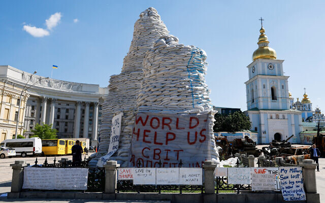 Sand bags protect the Monument to Princess Olga, St. Andrew the Apostle and the educators Cyril and Methodius in Kyiv, June 16, 2022. (Ludovic Marin, Pool via AP) Sand bags protect the Monument to Princess Olga, St. Andrew the Apostle and the educators Cyril and Methodius in Kyiv, June 16, 2022. (Ludovic Marin, Pool via AP)