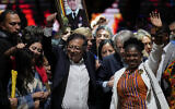 Former rebel Gustavo Petro and his running mate Francia Marquez, celebrate before supporters after winning a runoff presidential election in Bogota, Colombia, Sunday, June 19, 2022. (AP Photo/Fernando Vergara)