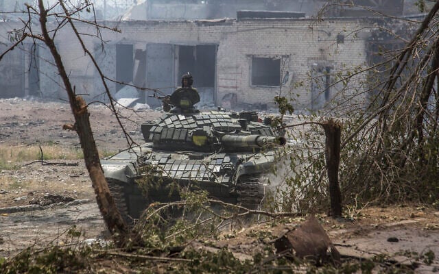 A Ukrainian tank is in position during heavy fighting on the front line in Severodonetsk, the Luhansk region, Ukraine, June 8, 2022. (AP Photo/Oleksandr Ratushniak) A Ukrainian tank is in position during heavy fighting on the front line in Severodonetsk, the Luhansk region, Ukraine, June 8, 2022. (AP Photo/Oleksandr Ratushniak)