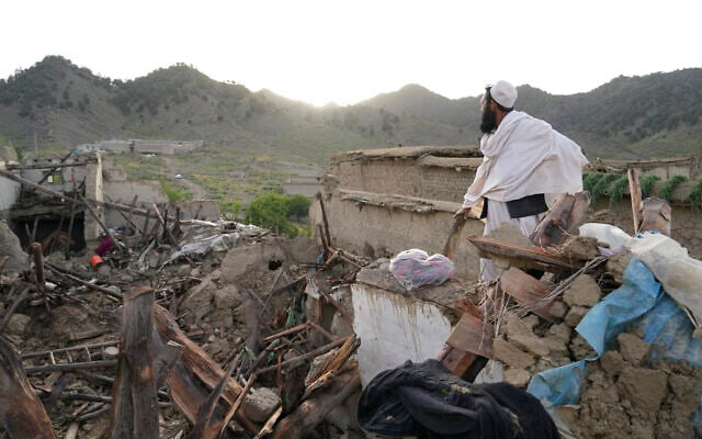 A man stands among destruction after an earthquake in Gayan village, Afghanistan, June 23, 2022. (AP Photo/Ebrahim Nooroozi) A man stands among destruction after an earthquake in Gayan village, Afghanistan, June 23, 2022. (AP Photo/Ebrahim Nooroozi)