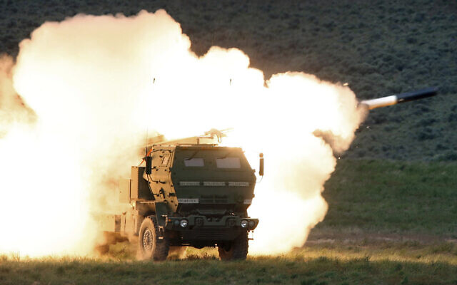 In this file photo from May 23, 2011, a launch truck fires the High Mobility Artillery Rocket System (HIMARS) produced by Lockheed Martin during combat training in the high desert of the Yakima Training Center, Washington. (Tony Overman/The Olympian via AP, File) In this file photo from May 23, 2011, a launch truck fires the High Mobility Artillery Rocket System (HIMARS) produced by Lockheed Martin during combat training in the high desert of the Yakima Training Center, Washington. (Tony Overman/The Olympian via AP, File)